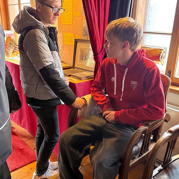 Zeitmaschine Root, Schuh- & Filmemacher